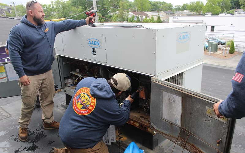 Yellow Dog technician providing AC & HVAC Repair service