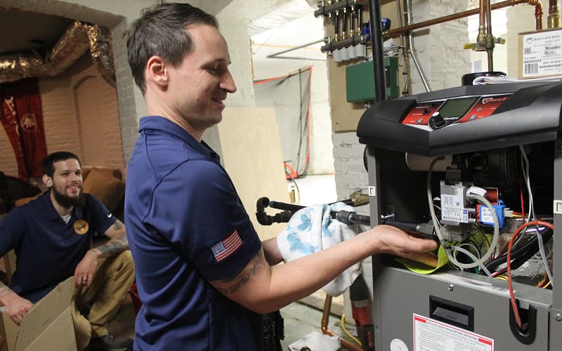 Yellow Dog technician working on HVAC equipment